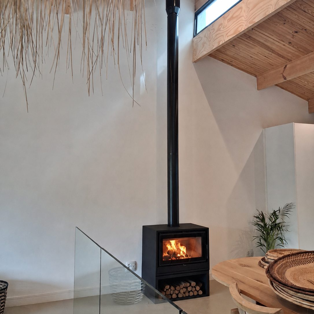 Kratki Alta Fs freestanding fireplace with wood storage