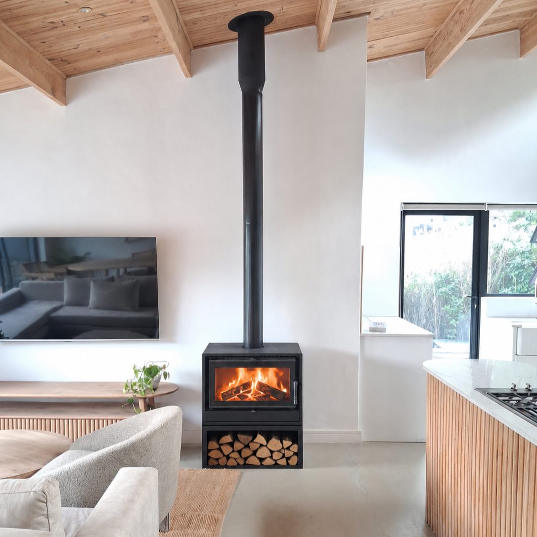 Alta Freestanding fireplace with logbox Freestanding wood fireplace Closed combustion fireplace Wood-burning stove Steel fireplace